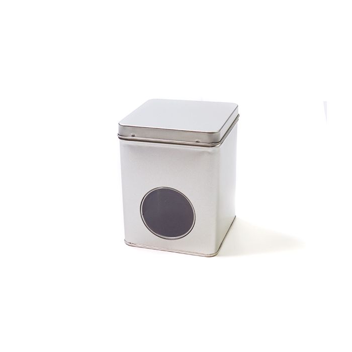 Groot voorraadblik met rond venster