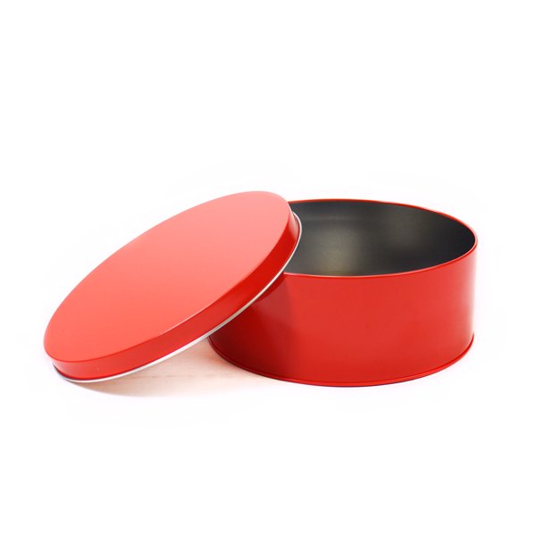 Rood rond koekblik open deksel